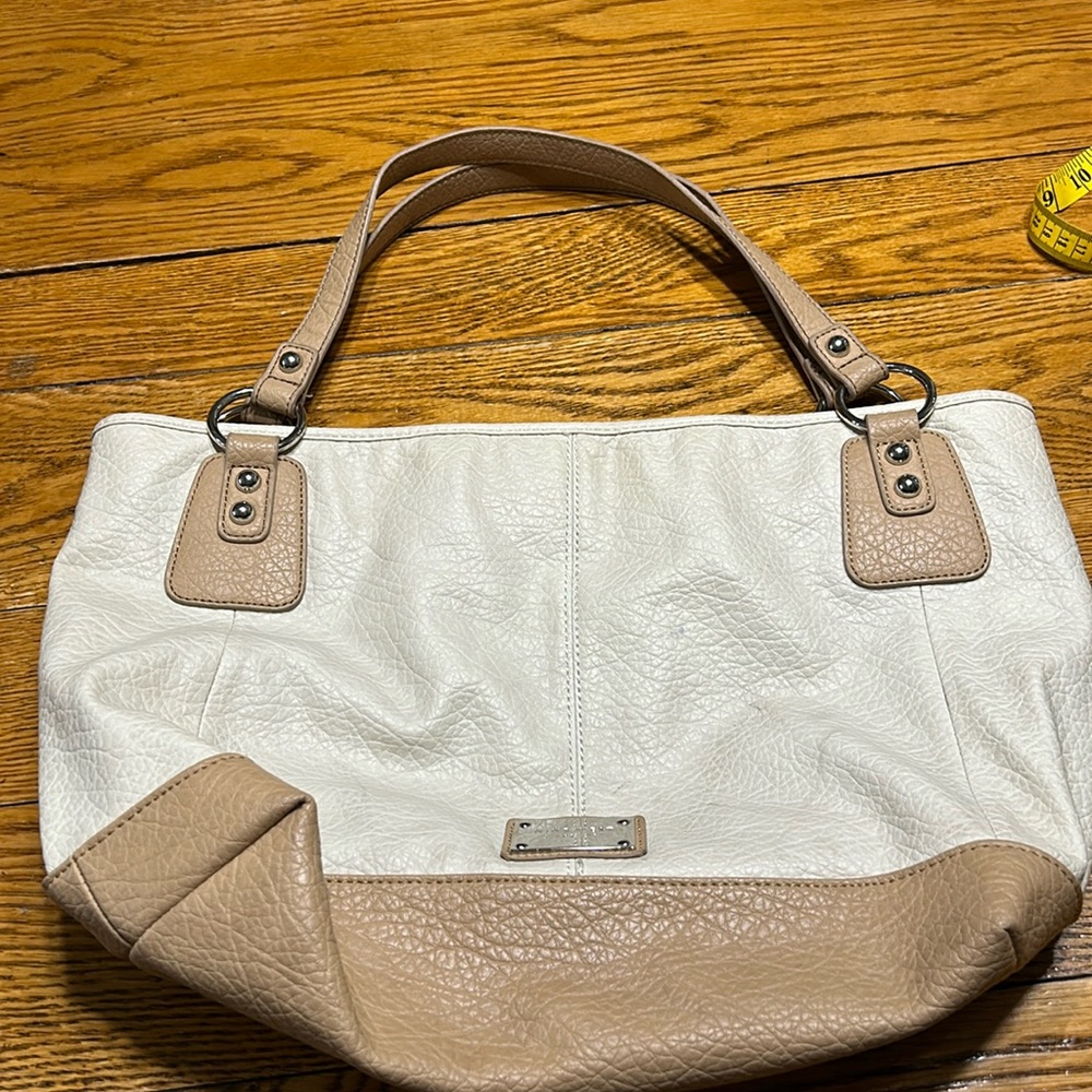 Nine West faux leather cream and tan tote. Logo and hardware in silver.